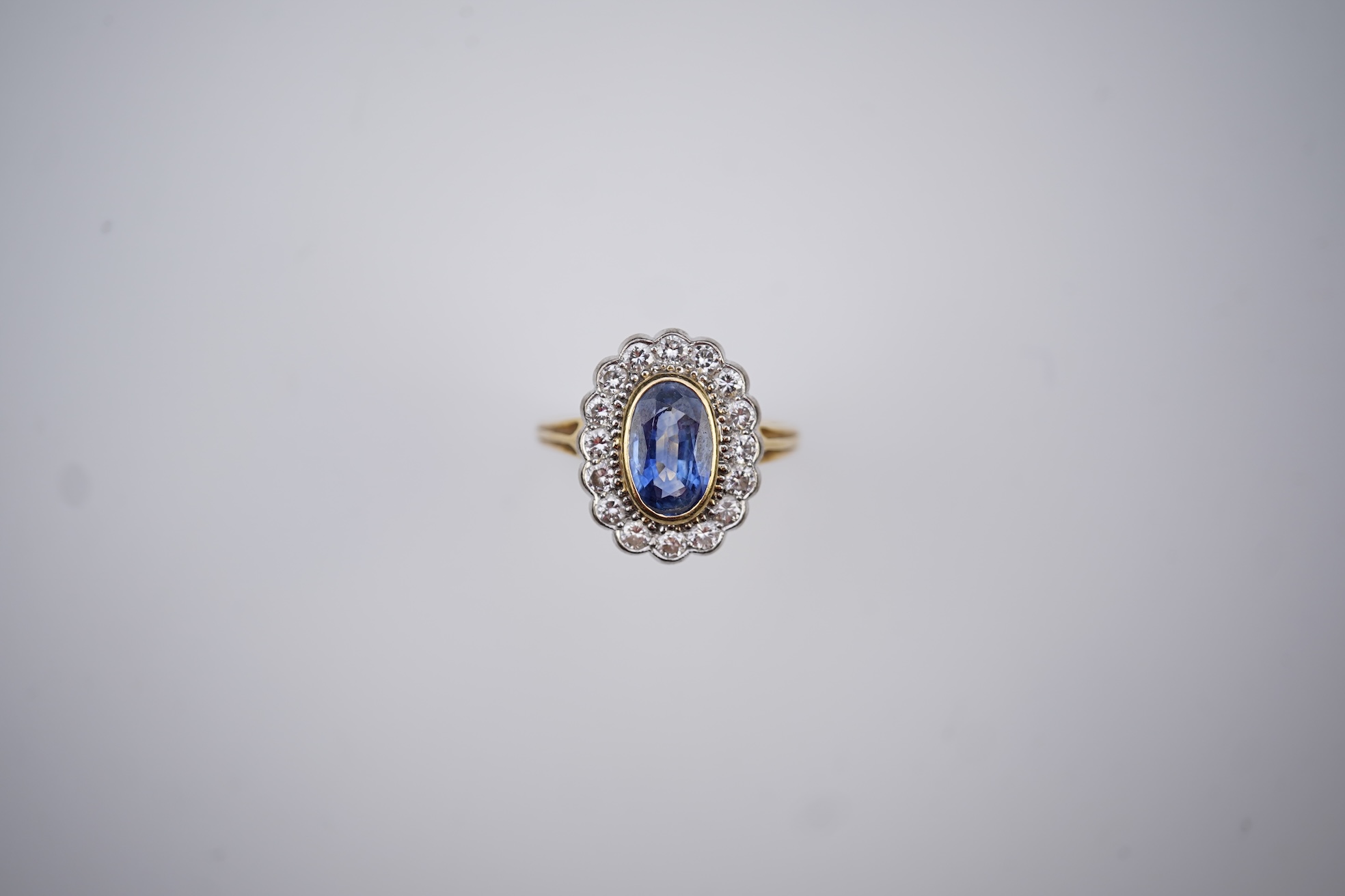 A sapphire and diamond ring